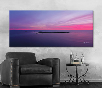 A no filter aerial photography sunset capture that is simply sensational! The pink and purple hues really are out of this world creating an atmosphere that is somewhat magical, bringing with it a sense of peace. This coastal landscape photograph is available in a selection of canvas sizes.